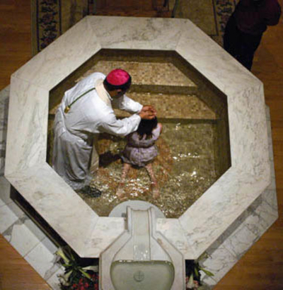 Catholic Christian Baptism by total immersion into Blessed water